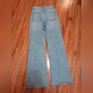 Wide leg slightly ripped jeans